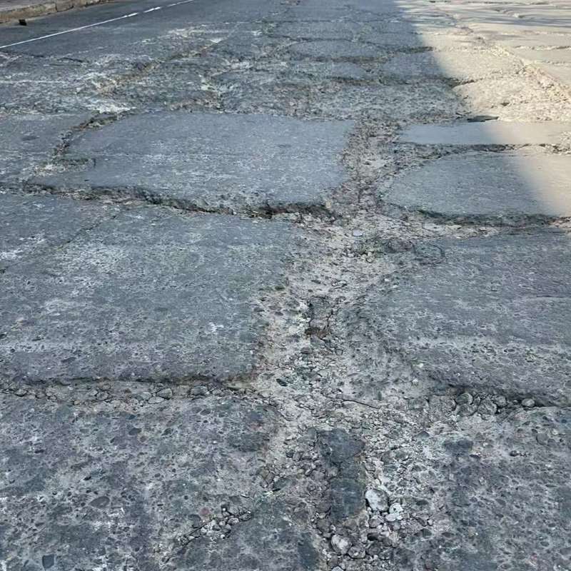 瑞丽路面起砂露石子修补料